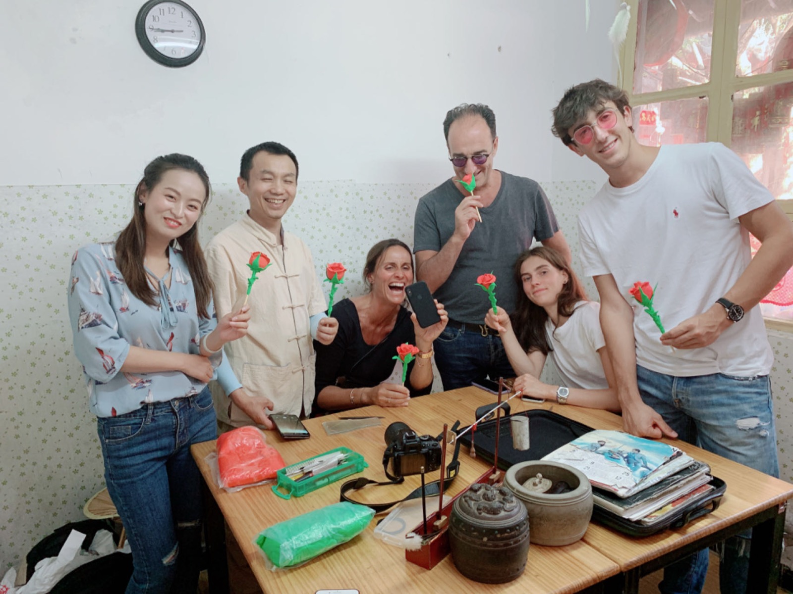 Guests smiling during a Beijing hands-on cultural experience